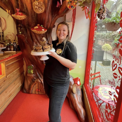 Em in the store holding cookie pies